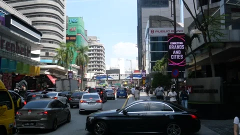 Traffic jam and city train in Bukit Bintang, Malaysia Stock Footage 266921604