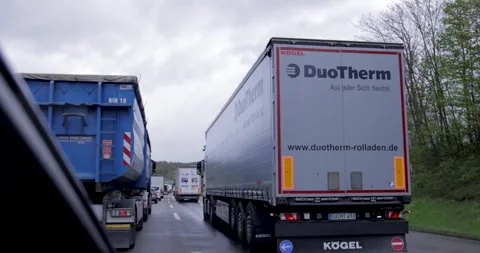 Traffic jam on the autobahn in Europe. Difficulty on the road Stock Footage 241507484