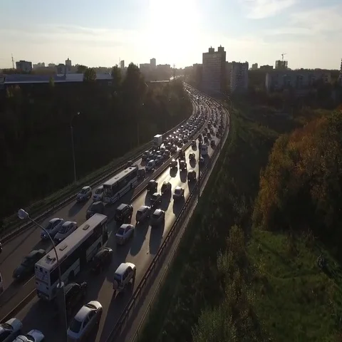 Traffic jam on the bridge at sunset Stock Footage 69550246