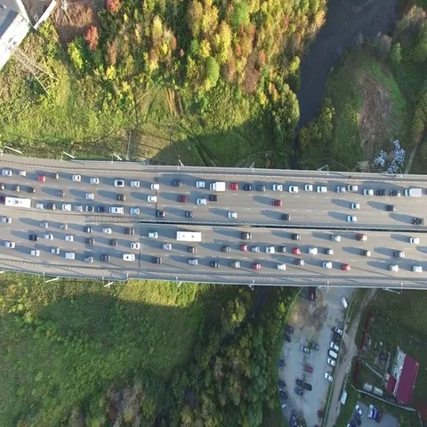 Traffic jam on the bridge at sunset Stock Footage 69550588