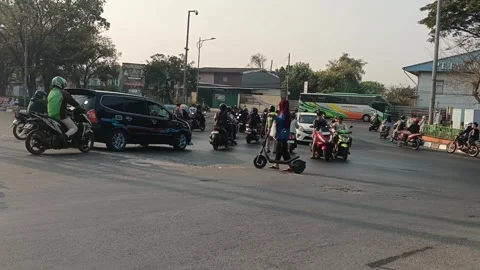 Traffic Jam at Busy Intersection in Indonesia Stock Footage 347936740