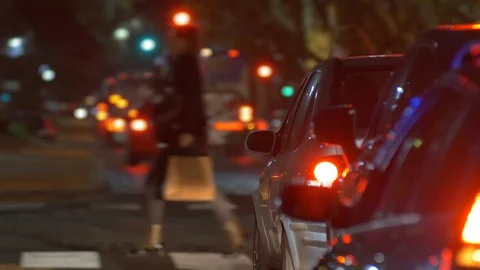 Traffic Jam in the city, Traffic Light, pedestrians, vehicles, cars. Dusk. Night Stock Footage 108344871
