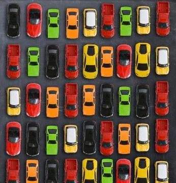 Traffic jam concept with multiple toy cars on a blackboard Fotos Stock