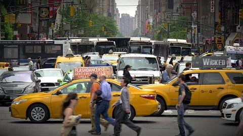 Traffic jam congested street rush hour cars taxi pedestrians New York City NYC Stock Footage