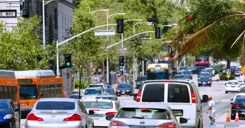 Traffic jam during rush hour in Los Angeles Downtown California 4K RAW Stock Footage 64970753
