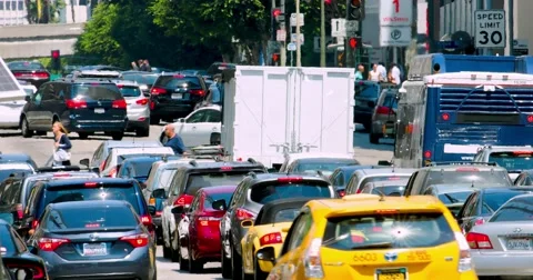 Traffic jam during rush hour in Los Angeles Downtown, California,  4K, RAW Stock Footage 66691930