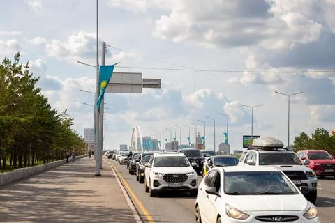 A traffic jam during rush hour on Sarayshyk Street and on Arghar Bridge Stock Photos