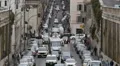 Traffic jam in European city, cars moving slowly in lanes, transportation system HD Footage