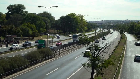 Traffic jam on freeway road in city on sunny day,rush hour, sunny day. Stock Footage 82470898