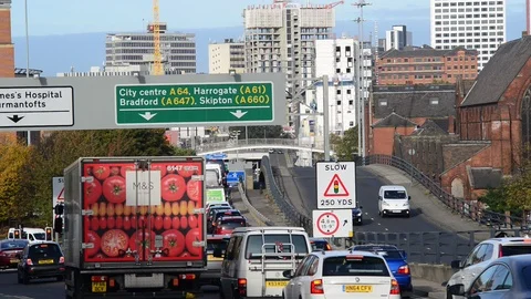Traffic jam heading into the city centre of leeds yorkshire united kingdom Stock Footage 96601834