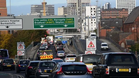 Traffic jam heading into the city centre of leeds yorkshire united kingdom Stock Footage 96601865