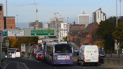 Traffic jam heading into the city centre of leeds yorkshire united kingdom Stock Footage 96602324
