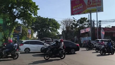 Traffic jam at the intersection of traffic lights. East Java - October 1, 2025 Stock Footage 323673749