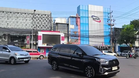 Traffic jam at the intersection of traffic lights. East Java - October 1, 2025 Stock Footage 323673752