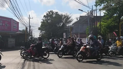 Traffic jam at the intersection of traffic lights. East Java - October 1, 2025 Stock Footage 323673758