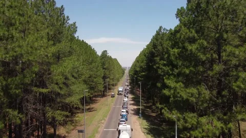 Traffic jam with long queue of trucks and cars on rural Gualeguaychu-Fray Stock Footage 233975807