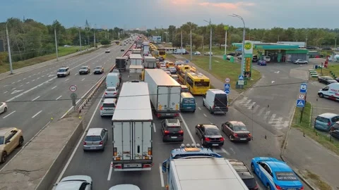 Traffic jam at on one side of the road in Kyiv, capital of Ukraine Video stock 318418737