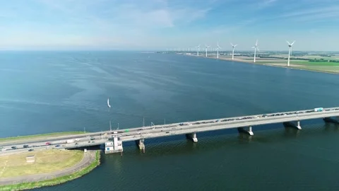 Traffic Jam Overview with Wind Turbines - Flevoland, Holland, 4K Drone Stock-Footage 145927265