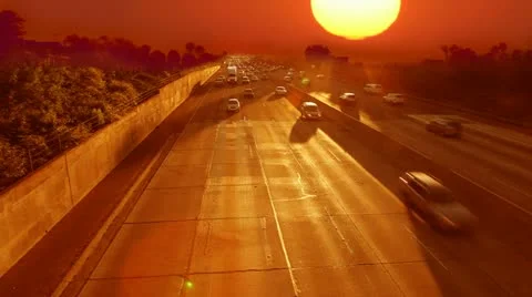 Traffic jam at rush hour on Los Angeles freeway at sunset in California Stock Footage 11400059