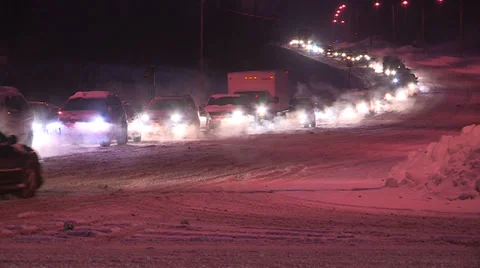 Traffic jam in snow storm at night Stock Footage 36603663