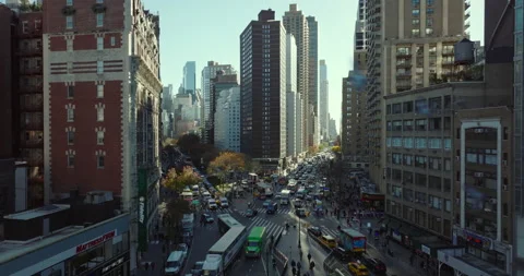 Traffic jam in streets of large city. Slowly moving or waiting vehicles in queue Stock Footage 167751968