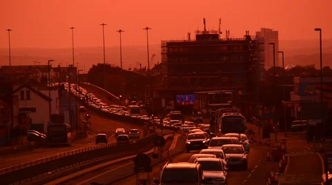 Traffic jam at sunset queueing at roadworks in the city of leeds uk Stock Footage 68703396
