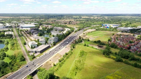 Traffic at junction 12 of the M4 motorway in Reading, Berkshire, UK Stock Footage 136487160
