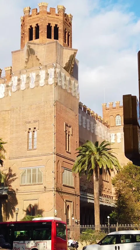 Traffic landscape of Barcelona classical tower building next to Arc de Triomf Stock Footage 299905802