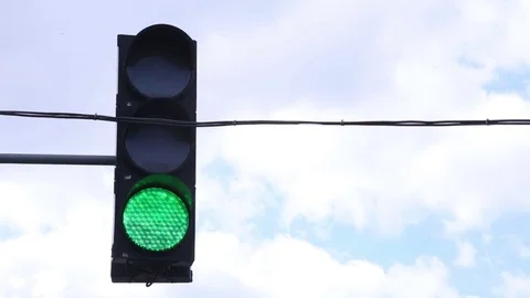 Traffic light against the sky time-laps Stock Footage 73801519