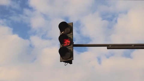 Traffic Light And blue Sky With Clouds in the city Stock Footage 82369452