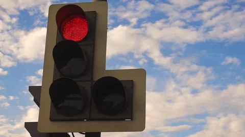 Traffic Light And blue Sky With Clouds in the city Stock Footage 82369467