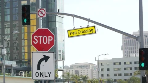 Traffic light and caution sign, road intersection in USA. Transportation safety Video stock 142060143