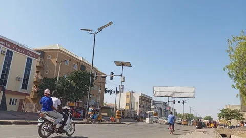 Traffic Light And Road Traffic On Airport Road Kano Nigeria 動画素材 324043222