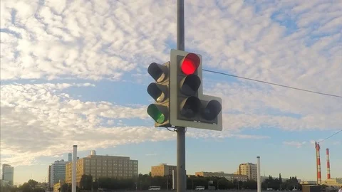 Traffic light and sky with clouds in the summer city timelapse Stock Footage 81603563