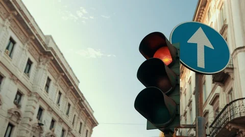 Traffic light is broken and yellow light doesn't work. Red switches to green Stock Footage 129891477
