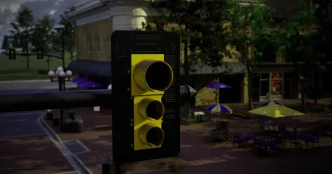 Traffic light at a busy urban intersection during evening hours Stock Footage 306308220