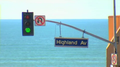 Traffic light changes in front of ocean Stock Footage 740236