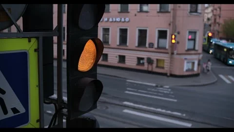 Traffic Light Changes to Green at Intersection in Urban Setting During Late Stock Footage 310810247
