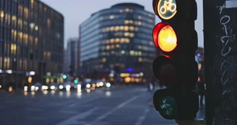 Traffic Light Changes from Red to Green on City Intersection. SLOW MOTION 4K. Stock-Footage 140295060