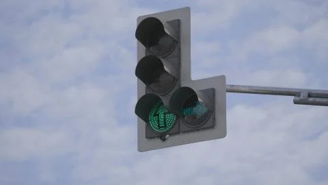 Traffic light changes from red to green 스톡 사진