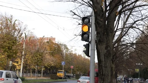Traffic light changes from yellow to red Stock Footage 119691465