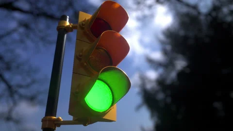 Traffic light changing from green to red Stock Footage 178658667
