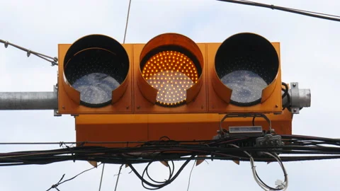 Traffic light changing from green to yellow and red stop at School Zone Stock Footage 164006837