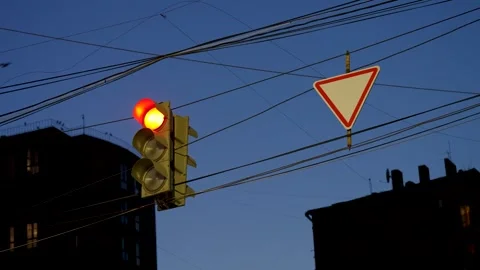 Traffic Light Changing from red to green․ Road Sign Give Way. Stock Footage 282791975