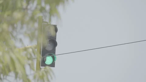 Traffic Light Changing From Red to Green 10bit slog3 Stock Footage 345619695