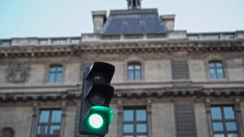Traffic light closeup. Facade in the Baroque style is in the background. Daytime Stock-Footage 125220225