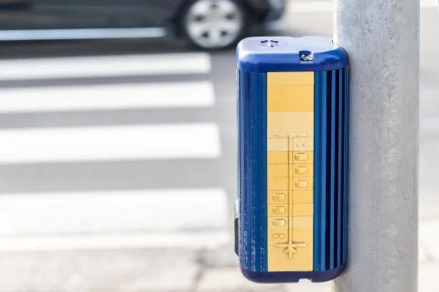 Traffic light control button with crosswalk scheme for blind people. Pedestrian Stock-Fotos
