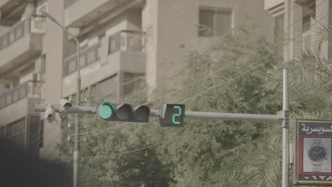 Traffic light count down in green going to red light Stock Footage 310255187