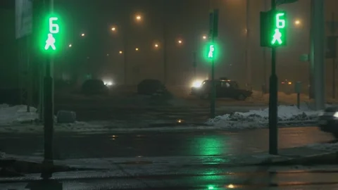 Traffic light with digits blinks green and turns red on pedestrian crossing at Stock Footage 129931443