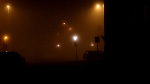 Traffic light flash yellow night fog 02 Stock Footage 98126046